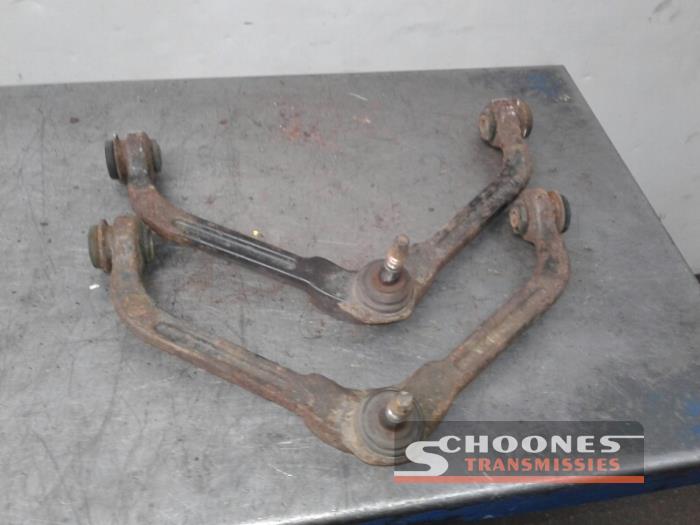 Front upper wishbone, left from a Jeep Cherokee 2005