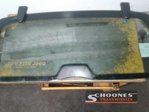 Used Rear window Jeep Cherokee Price on request offered by Schoones Transmissies B.V.