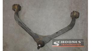 Used Front upper wishbone, left Jeep Cherokee Price on request offered by Schoones Transmissies B.V.