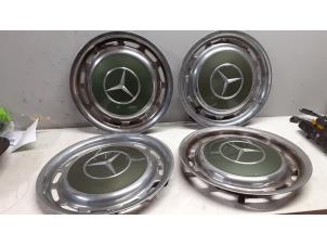 Used Wheel cover set Mercedes 200-280 (W123) 230 E Price on request offered by Tijdeman Mercedes Onderdelen