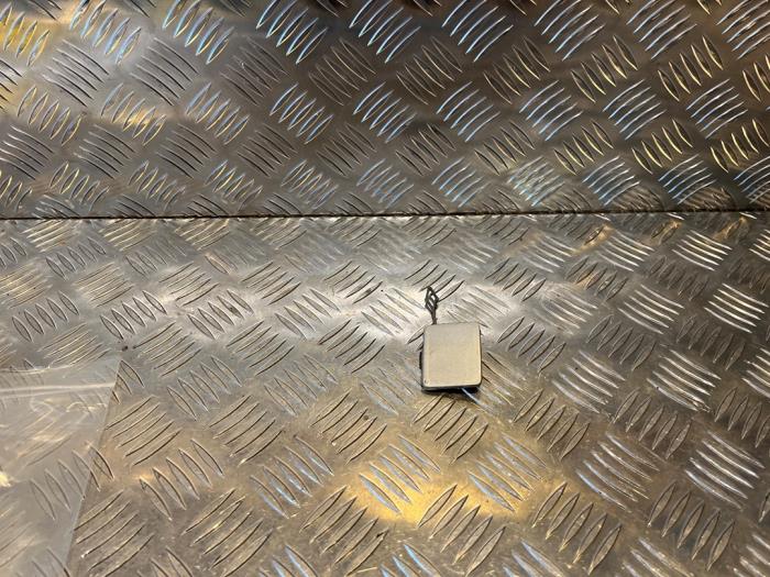 Tow hook cover