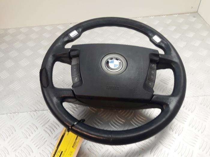 Left airbag (steering wheel) from a BMW 7 serie (E65/E66/E67) 735i,Li 3.6 V8 32V 2002