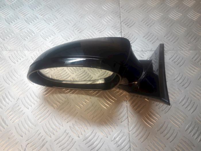 Wing mirror, left from a BMW 1 serie (E81) 123d 16V . 2007