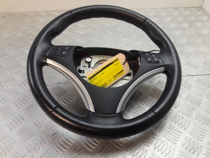 Steering wheel from a BMW 1 serie (E87/87N) 118d 16V 2008