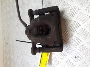 Used Front brake calliper, right BMW 1 serie (E87/87N) 118d 16V Price € 50,00 Margin scheme offered by Bentie's autodemontage