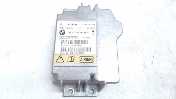 Airbag Module from a BMW X5 (E70) 3.0d 24V 2007