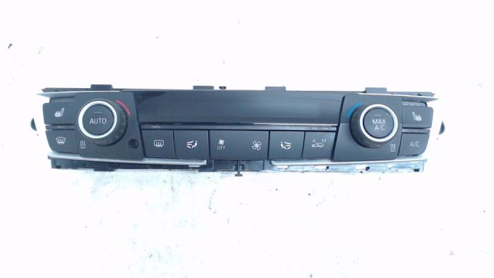 Panel de control de calefacción de un BMW 1 serie (F20) 118i 1.6 16V 2015