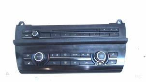 Used Radio control panel BMW 5 serie Touring (F11) 530d 24V Price € 149,00 Margin scheme offered by Bentie's autodemontage