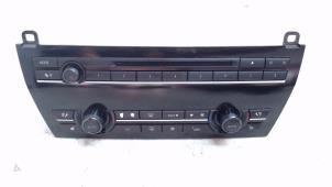 Used Radio control panel BMW 7 serie (F01/02/03/04) 740d 24V Price € 295,00 Margin scheme offered by Bentie's autodemontage