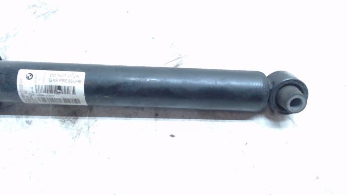 Rear shock absorber rod, left from a BMW 1 serie (F20) 118i 1.6 16V 2015