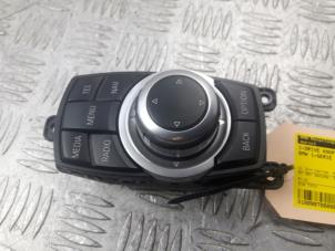 Used I-Drive knob BMW 1 serie (F20) 116i 1.6 16V Price € 99,00 Margin scheme offered by Bentie's autodemontage