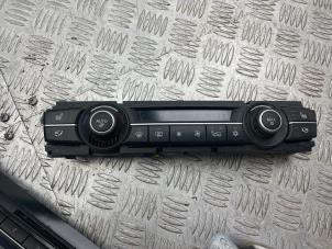Used Air conditioning control panel BMW X5 (E70) 30d xDrive 3.0 24V Price € 100,00 Margin scheme offered by Bentie's autodemontage