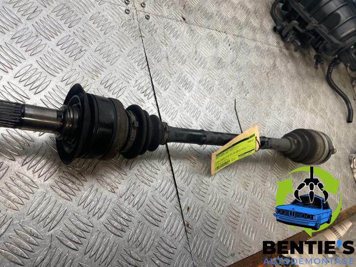 Drive shaft, rear left from a BMW 1 serie (F20) 116i 1.6 16V 2012