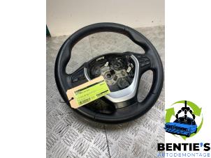 Used Steering wheel BMW 1 serie (F20) 114i 1.6 16V Price € 99,00 Margin scheme offered by Bentie's autodemontage
