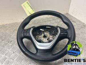 Used Steering wheel BMW 1 serie (F20) 116i 1.6 16V Price € 199,00 Margin scheme offered by Bentie's autodemontage