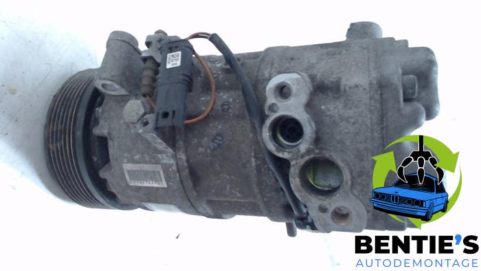 Air conditioning pump from a BMW 3 serie Touring (E91) 318i 16V 2010