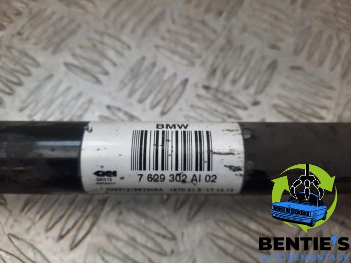 Drive shaft, rear right from a BMW 1 serie (F20) 116i 1.6 16V 2013
