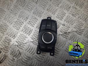 Used I-Drive knob BMW 1 serie (F20) 114i 1.6 16V Price € 75,00 Margin scheme offered by Bentie's autodemontage