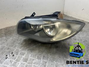 Used Headlight, left BMW 1 serie (E81) 116i 1.6 16V Price € 60,00 Margin scheme offered by Bentie's autodemontage