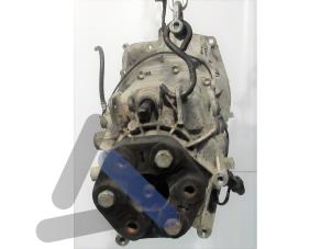 Engine mount from a Volkswagen Jetta III (1K2) 1.9 TDI 2006