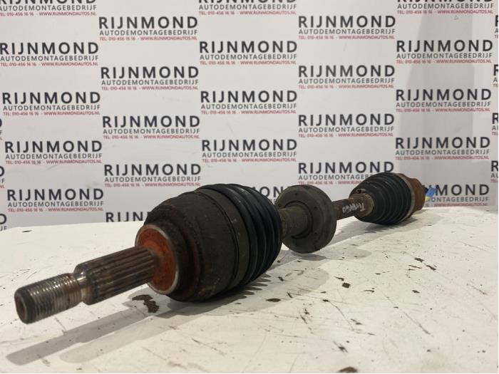 Front drive shaft, left from a Renault Twingo II (CN) 1.5 dCi 70 2010
