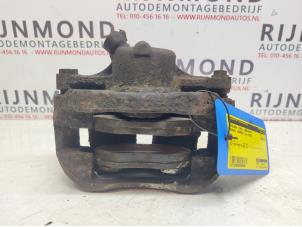 Used Front brake calliper, left Renault Kangoo Express (FW) 1.5 dCi 70 Price on request offered by Autodemontage Rijnmond BV