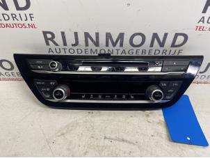 Usados Panel de control de calefacción BMW 5 serie (G30) 530e iPerformance Precio € 150,00 Norma de margen ofrecido por Autodemontage Rijnmond BV