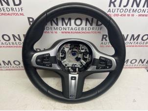 Used Steering wheel BMW 5 serie (G30) 530e iPerformance Price € 425,00 Margin scheme offered by Autodemontage Rijnmond BV