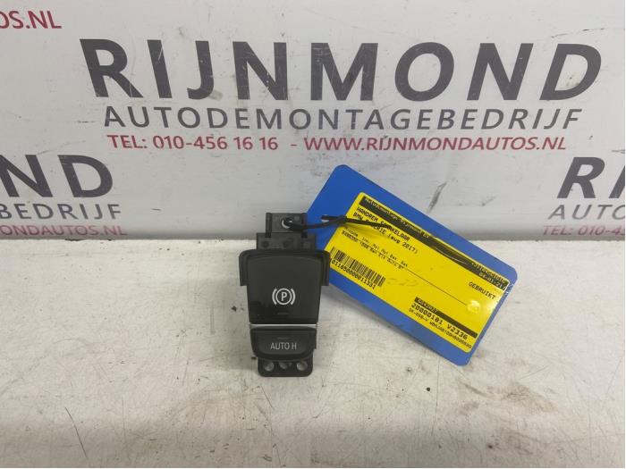 Parking brake switch from a BMW 5 serie (G30) 530e iPerformance 2017