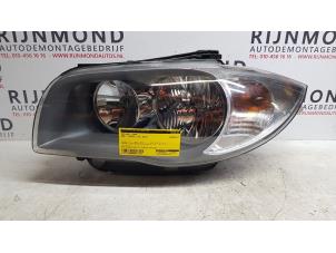 Used Headlight, left BMW 1 serie (E87/87N) 116i 2.0 16V Price € 90,75 Inclusive VAT offered by Autodemontage Rijnmond BV
