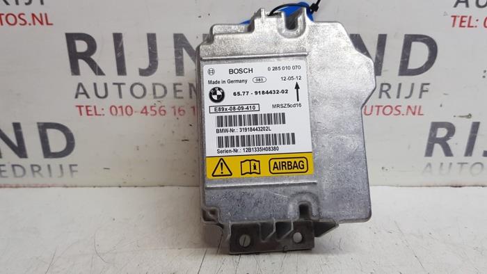 Airbag Module from a BMW X1 (E84) sDrive 20d 2.0 16V 2012