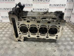 Used Cylinder head Mini Coupe (R58) 1.6 16V John Cooper Works Price € 907,50 Inclusive VAT offered by Autodemontage Rijnmond BV