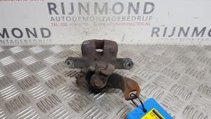 Used Rear brake calliper, right Mini Mini (R56) 1.6 16V Cooper S Price € 48,40 Inclusive VAT offered by Autodemontage Rijnmond BV