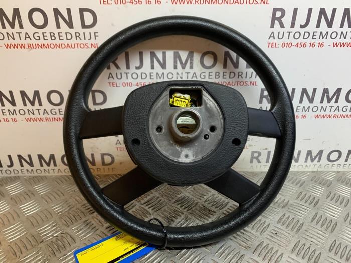 Steering wheel from a Volkswagen Polo IV (9N1/2/3) 1.4 TDI 80 2009