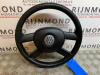 Steering wheel from a Volkswagen Polo IV (9N1/2/3) 1.4 TDI 80 2009