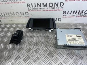 Used Navigation set BMW 1 serie (F20) 120d 2.0 16V Price € 635,25 Inclusive VAT offered by Autodemontage Rijnmond BV