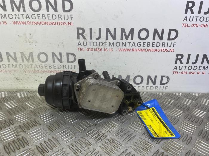 Oil filter housing from a Mercedes-Benz B (W246,242) 1.6 B-180 BlueEFFICIENCY Turbo 16V 2014