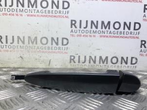 Used Rear door handle 4-door, left BMW 1 serie (F20) 118d 2.0 16V Price on request offered by Autodemontage Rijnmond BV