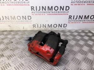 Used Front brake calliper, left Mini Mini (R56) 1.6 16V One Price on request offered by Autodemontage Rijnmond BV