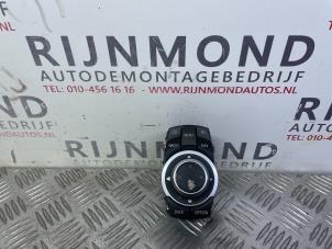 Used I-Drive knob BMW X5 (E70) xDrive 40d 3.0 24V Price € 181,50 Inclusive VAT offered by Autodemontage Rijnmond BV