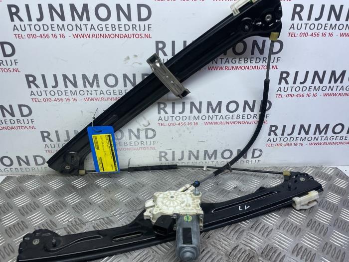 Door window regulator with motor