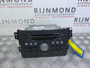 Usados Reproductor de CD y radio Opel Agila (B) 1.0 12V Precio € 50,00 Norma de margen ofrecido por Autodemontage Rijnmond BV