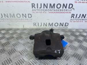 Used Front brake calliper, left Kia Sportage (JE) 2.0 CVVT 16V 4x2 Price € 50,00 Margin scheme offered by Autodemontage Rijnmond BV