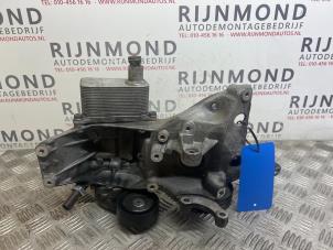Used Alternator lower bracket Audi A5 Cabrio (8F7) 2.0 TFSI 16V Price on request offered by Autodemontage Rijnmond BV