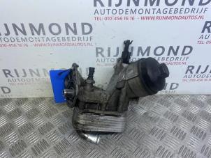 Used Oil filter housing Opel Astra J (PC6/PD6/PE6/PF6) 1.7 CDTi 16V 110 Price on request offered by Autodemontage Rijnmond BV