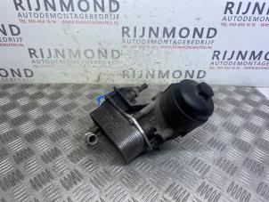 Used Oil filter holder Opel Astra J Sports Tourer (PD8/PE8/PF8) 1.7 CDTi 16V Price on request offered by Autodemontage Rijnmond BV