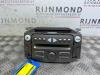 Radio CD player from a Daihatsu Sirion 2 (M3), 2005 1.0 12V DVVT, Hatchback, Petrol, 998cc, 51kW (69pk), FWD, 1KRFE, 2005-01 / 2013-06, M300 2007