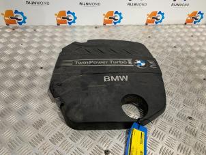 Usados Chapa protectora motor BMW 1 serie (F20) 116d 2.0 16V Precio € 48,40 IVA incluido ofrecido por Autodemontage Rijnmond BV