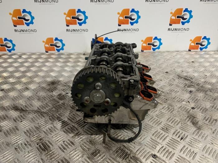 Cylinder head Volkswagen Polo V 1.2 TDI 12V BlueMotion - 03P103 CFWA