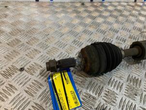 Used Front drive shaft, left Daihatsu Sirion 2 (M3) 1.3 16V DVVT Price on request offered by Autodemontage Rijnmond BV